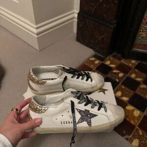 Golden Goose White Sneakers with Glitter Gold Heel and Black Star